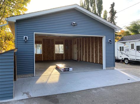 can you attach a metal garage to a house|how to attach garage to house.